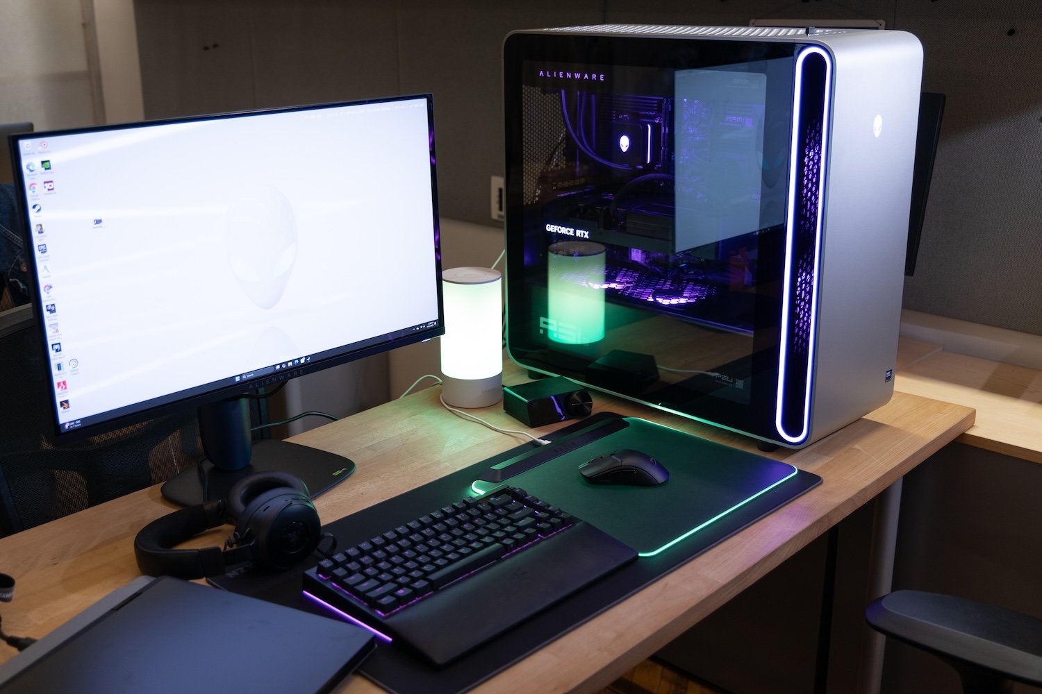 Alienware Area 51 PC next to an Alienware QD-OLED Monitor