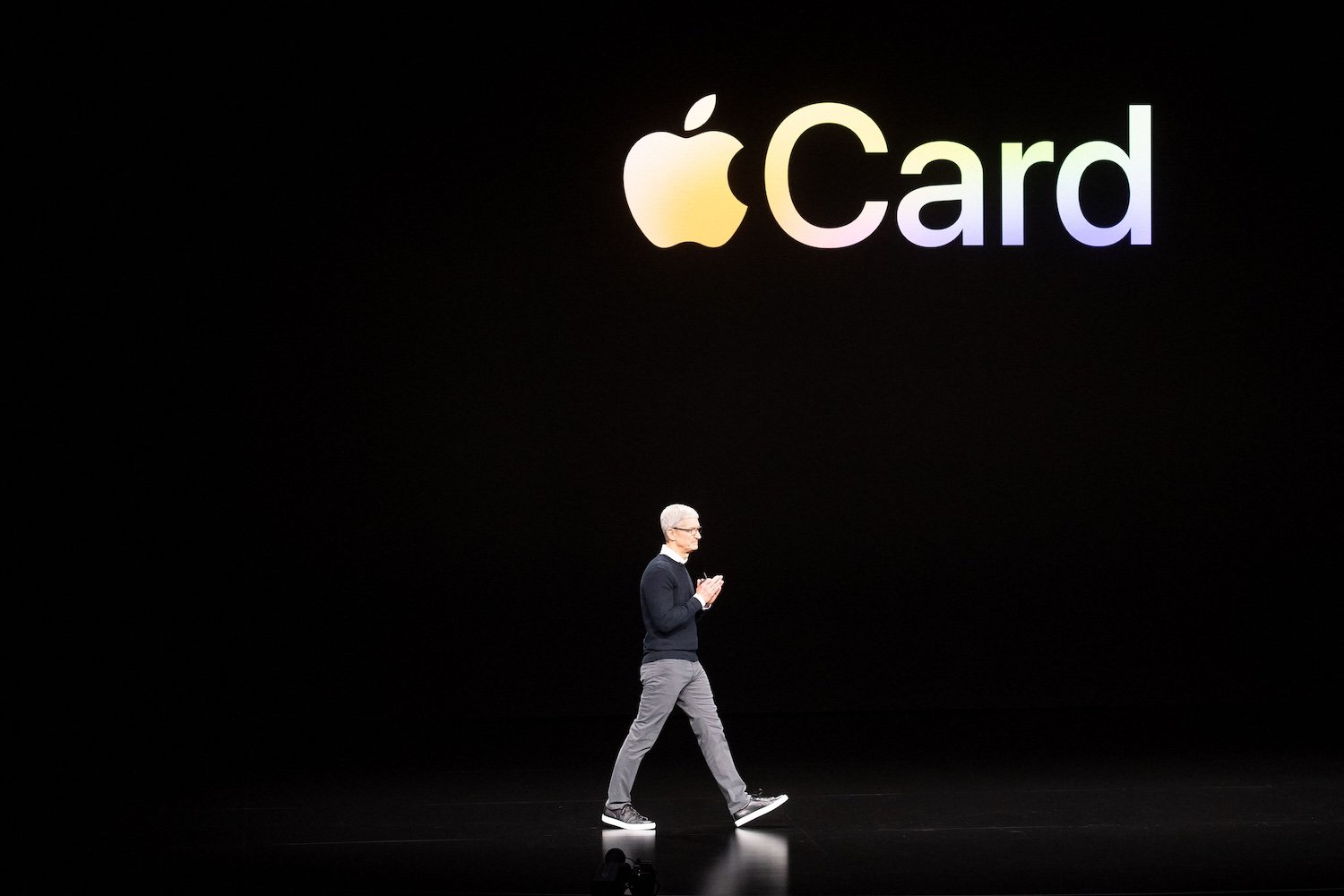 Apple CEO Tim Cook standing on stage introducing the Apple Card.