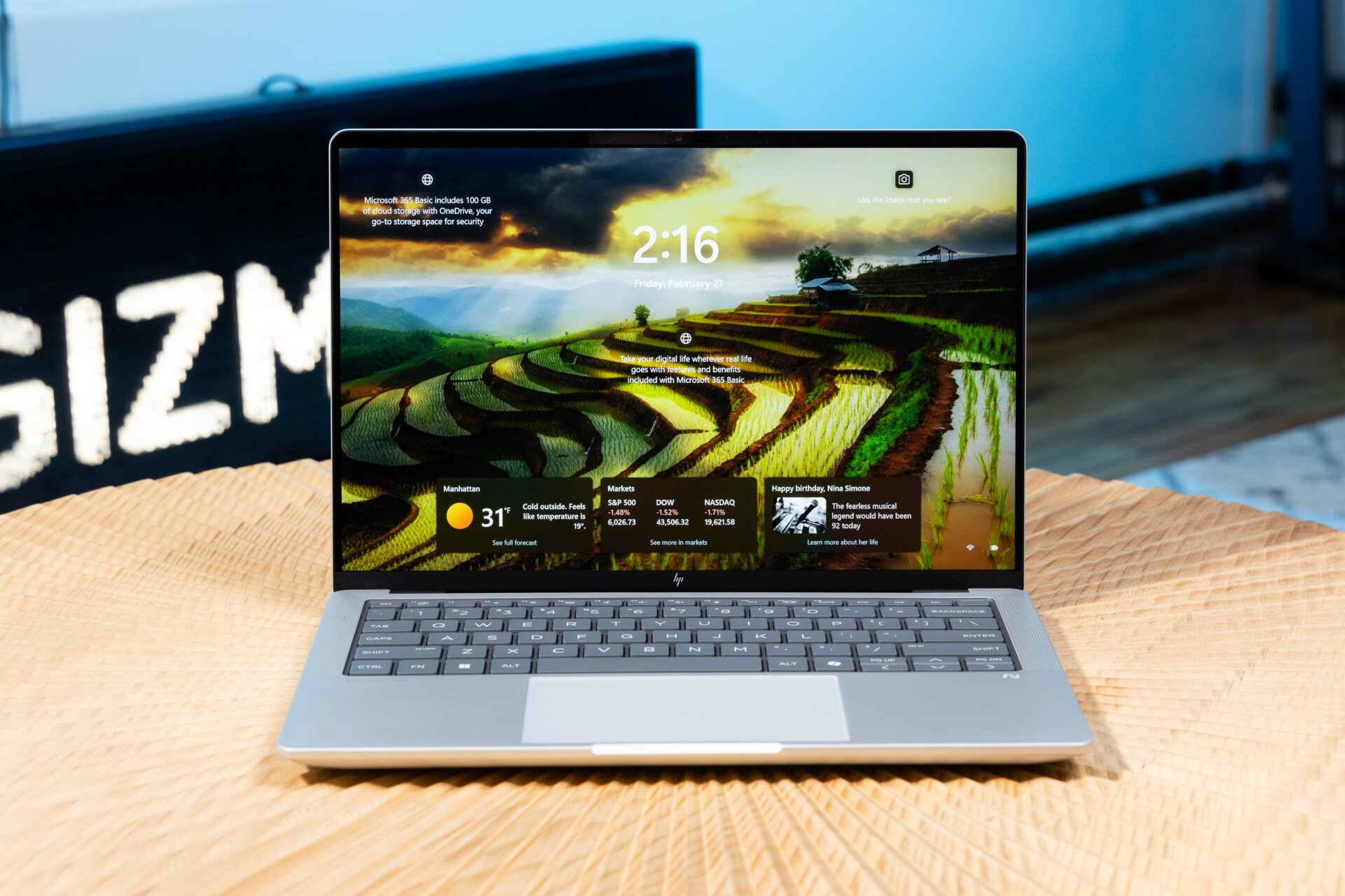 HP EliteBook X G1a on. wooden table with Gizmodo sign in the background
