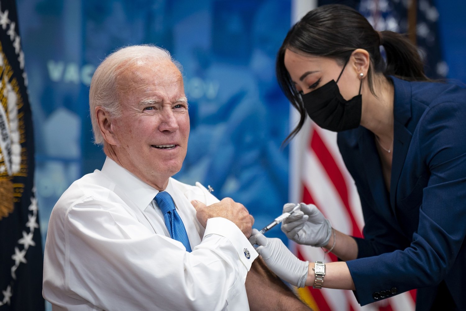 Joe Biden receives a booster dose of the Covid-19 vaccine targeting the Omicron BA.4/BA.5 subvariants in the Eisenhower Executive Office Building in Washington, DC, US, on Tuesday, Oct. 25, 2022.