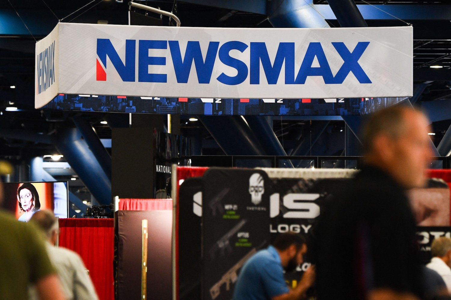 Newsmax booth at an NRA convention