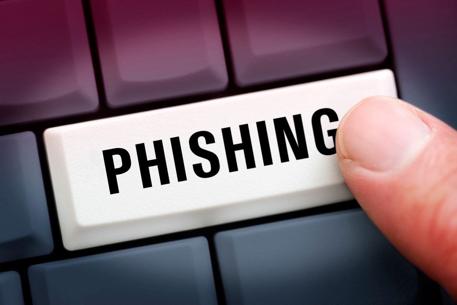 An illustration of a keyboard button reading "phishing"