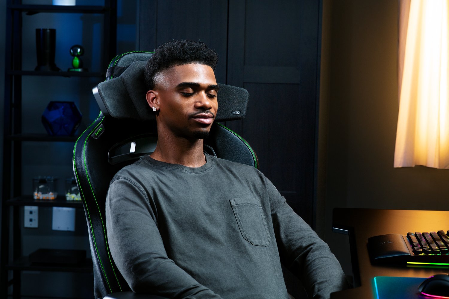 Razer Clio Hero Man Sitting In Chair